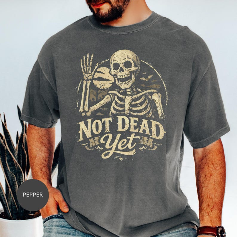 Not Dead Yet Skeleton All products () Vintage Halloween Graphic, Funny Skull Design, Spooky Ghost Bones Gift, Sarcastic Quote
Not Dead Yet