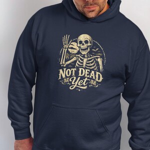 Skeleton Not Dead Yet Shirt, Funny Halloween Design, Waving Skeleton, Spooky Bat Moon Graphic, Vintage Creepy Pun
40