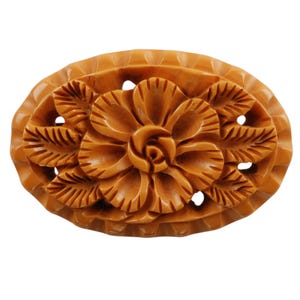 Large Vintage Deeply Carved Reticulated Bakelite Oval Brooch with Floral Motif
