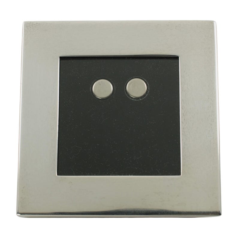 May include: A square, silver-toned light switch plate with a black center. Two small, circular buttons are centered on the black square. The plate has a brushed metal finish and a simple, modern design.