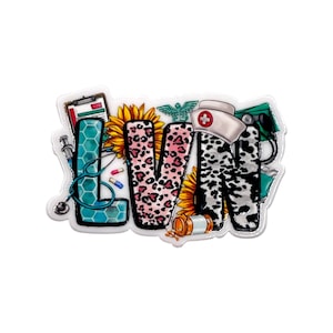 May include: A decorative badge featuring the letters "LVN" with medical and floral elements. The "L" is teal with a stethoscope and syringe, the "V" is leopard print, and the "N" is black and white cow print. Includes a nurse's hat, pills, and sunflowers.