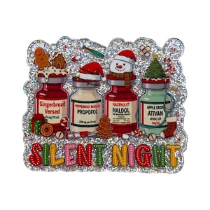 May include: A rectangular glittery sticker featuring four medical vials labeled Gingerbread Versed, Peppermint Mocha Propofol, Hazenulet Haldol, and Apple Crisp Ativan. The vials are decorated with holiday items like a snowman, Santa hat, and tree. The text SILENT NIGHT is printed in colorful, bubbly letters at the bottom.