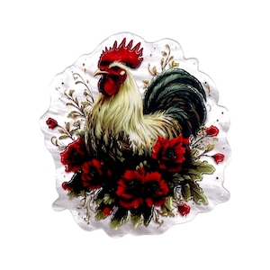 May include: A decorative glass plaque featuring a detailed illustration of a rooster with a bright red comb and cream-colored neck feathers. The rooster is surrounded by vibrant red poppy flowers, green leaves, and delicate gold-toned flourishes.
