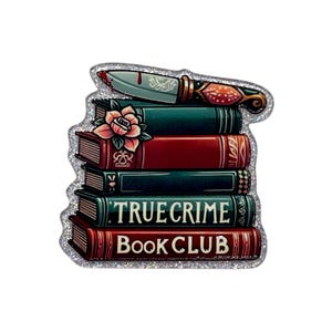 May include: A glittery pin featuring a stack of books with the words "TRUE CRIME Book CLUB." A bloody knife rests atop the books, and a rose is on the middle book. The books are in shades of red and green.
