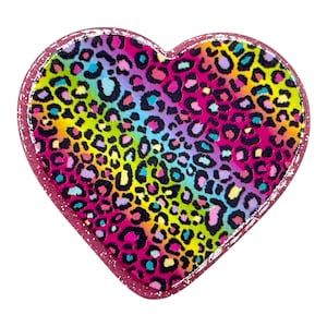 May include: A heart-shaped patch with a vibrant rainbow leopard print. The design features spots in shades of pink, yellow, blue, and green. The patch has a glittery pink border, creating a playful and eye-catching accessory.
