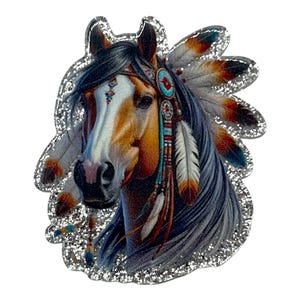 May include: A detailed image of a horse's head, adorned with a Native American headdress. The horse has a brown and white coat, with a dark mane and feathers. The image is outlined with silver glitter.