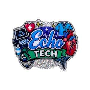 May include: A glittery pin featuring the text Echo TECH in blue and white. The design includes a medical ultrasound machine, a red heart, a blue scrub top, a stethoscope, a red heart with a white cross, and a caduceus symbol on a silver background.