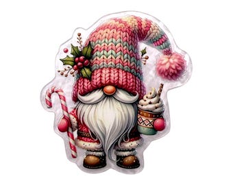 May include: A gnome sticker featuring a long white beard, wearing a pink and white knit hat with a pom-pom, holding a red and white candy cane in one hand and a cup of hot cocoa with whipped cream in the other, accented with holly berries.