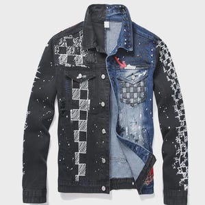 May include: A two-tone denim jacket with a black and blue design. The black side features white checkered patterns and paint splatters, while the blue side has distressed details and red accents. The jacket has a classic collar and button closures.