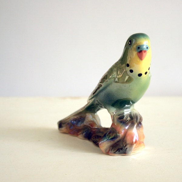 green budgie figure with lustre effect made by keele street pottery