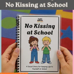 May include: A spiral-bound booklet titled No Kissing at School with a Safe Sphere logo. The cover features a cartoon illustration of two children with their hands over their mouths, with the subtitle A Social Story for Keeping Lips to Yourself at School.