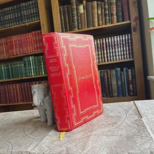 May include: A rustic wooden sign with the text "Welcome to our home" in white lettering. The sign features a distressed finish and a simple, inviting design, perfect for entryway decor.