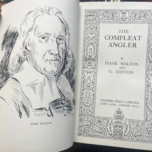 May include: Open book with a black and white illustration of a man on the left page and the title "The Compleat Angler" on the right page. The book is by Izaak Walton and C. Cotton, published by Odhams Press Limited, London.