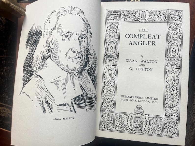 May include: Open book with a black and white illustration of a man on the left page and the title "The Compleat Angler" on the right page. The book is by Izaak Walton and C. Cotton, published by Odhams Press Limited, London.