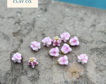 Contas de argila em formato de coroa com flores em degradê rosa claro | Materiais para confecção de joias havaianas