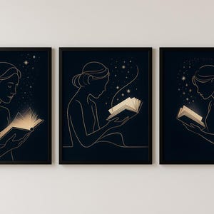 May include: Set of three framed art prints. Each print features a gold line drawing of a person reading a book, with light emanating from the pages. The background is a dark blue, with stars.