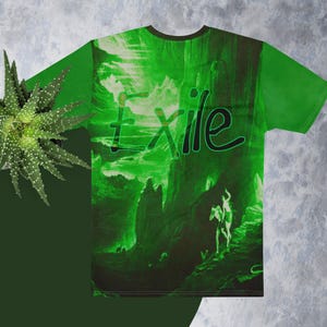 May include: Green t-shirt with a graphic design featuring the word "Exile" in a stylized font. The design includes a green landscape with figures. The shirt has a dark green collar.