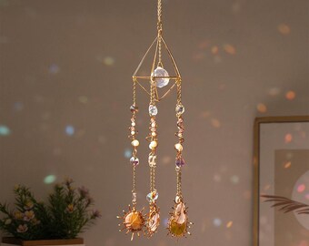 Crystal sun catcher with gemstone accents and boho hanging beads for window decor and rainbow light prism home decoration