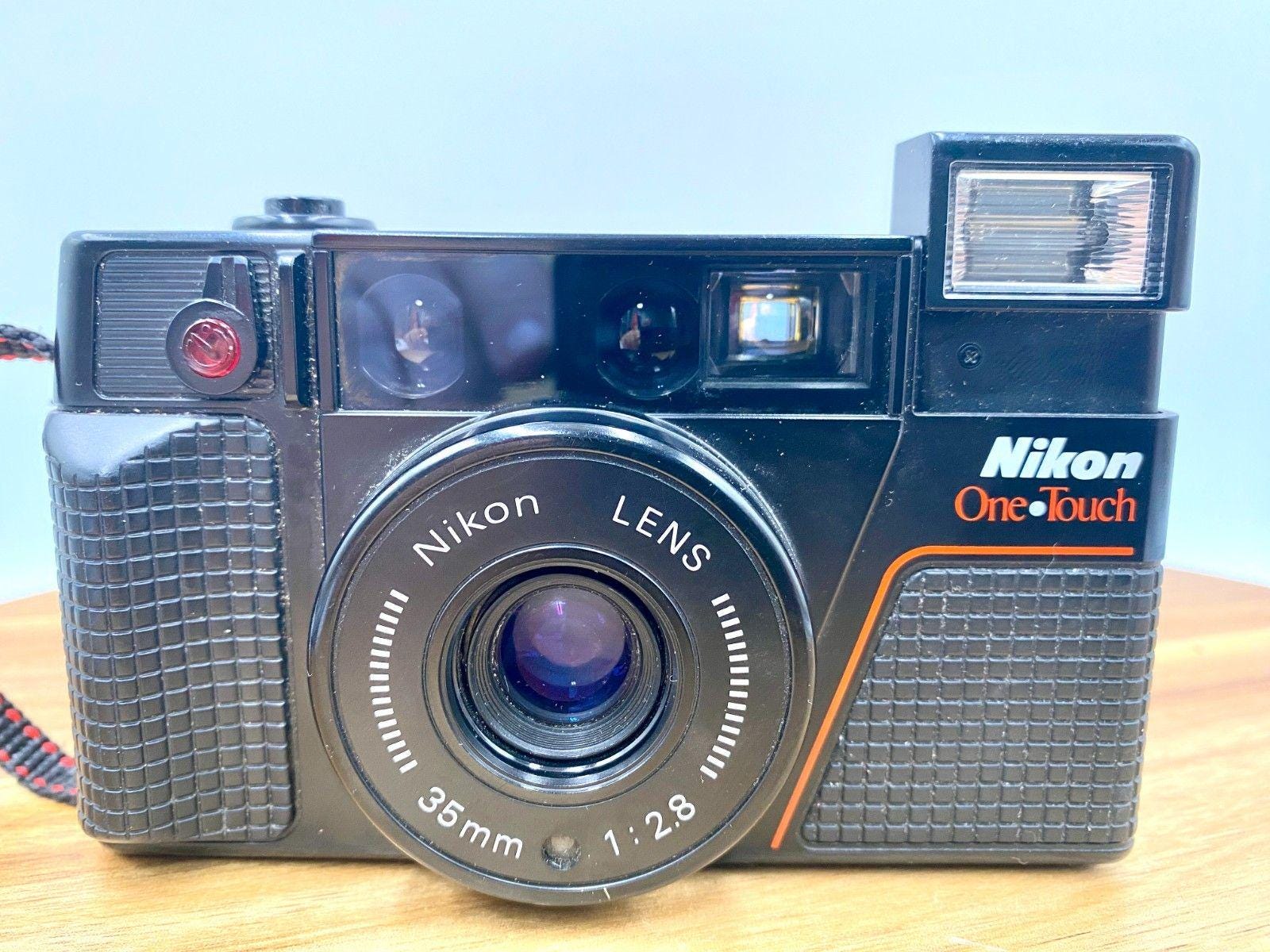 Appareil Photo Argentique Nikon L35 AF (35mm F/2.8, Autofocus) – état Nickel
