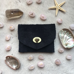 Cartera de piel negra hecha a mano