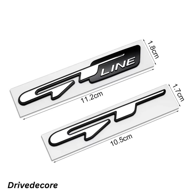 May include: Two black and white car emblems. The top emblem is 11.2 cm long and 1.8 cm wide, with the word "LINE" in white. The bottom emblem is 10.5 cm long and 1.7 cm wide. The brand name "Drivedecore" is at the bottom.
