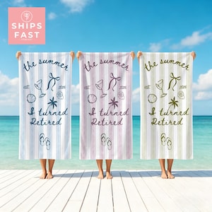 May include: Three beach towels with vertical stripes in blue, pink, and green. Each towel features the text "the summer" and "I turned Retired" with beach-themed illustrations. The towels are held up on a beach.