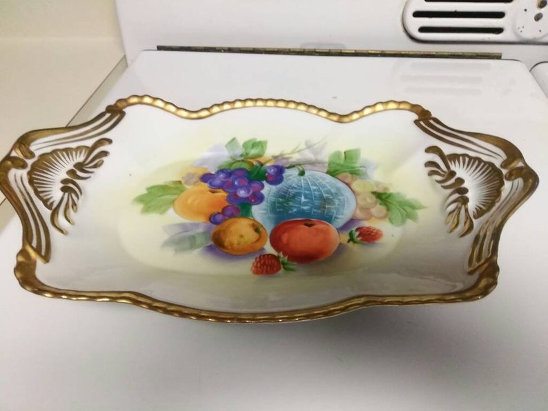Unusual vintage footed decorative dish with fruit motif and gold detailing