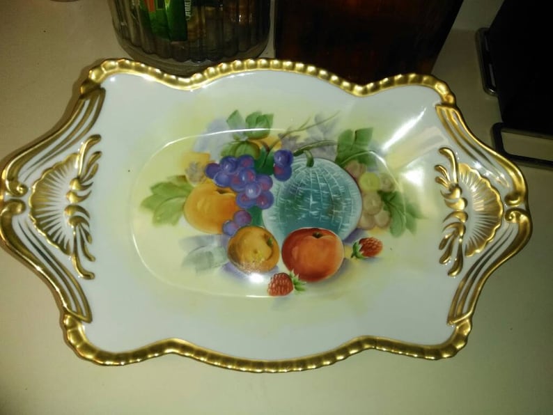 Unusual vintage footed decorative dish with fruit motif and gold detailing