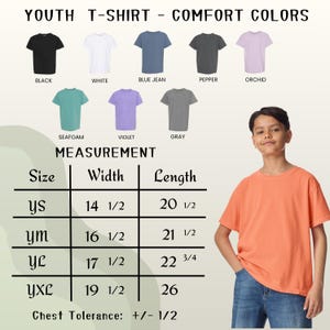 May include: A youth t-shirt in coral, with a size chart showing measurements in inches. The chart displays sizes YS, YM, YL, and YXL, with width and length measurements. The image also shows t-shirts in various colors.
