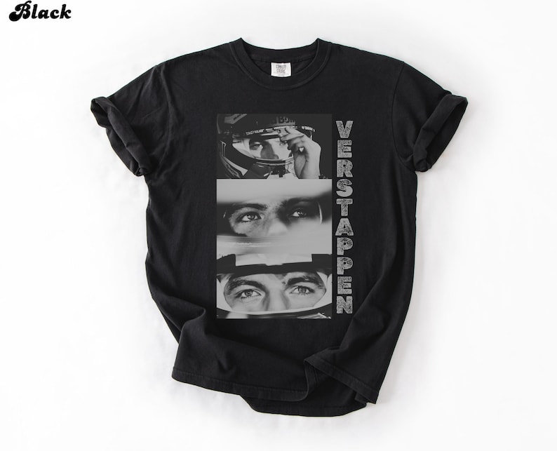 May include: Black t-shirt featuring a grayscale image of a person's face in three sections, with the name "VERSTAPPEN" printed vertically on the right side. The word "Black" is printed in the upper left corner.