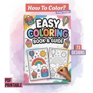Puede incluir: Un libro para colorear "Easy Coloring Book & Guide" con 73 diseños, con ilustraciones de arcoíris, cupcakes y globos aerostáticos. La portada incluye el texto "How To Color?" y "Cozy Things". Se muestra una mano coloreando con un lápiz amarillo.