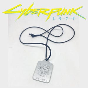 Może przedstawiać: Zestaw trzech ceramicznych kubk&oacute;w z nakrapianym, matowym wykończeniem. Kubki są w odcieniach kremu, jasnoszarym i ciemnoszarym. Każdy kubek ma prosty, minimalistyczny design.