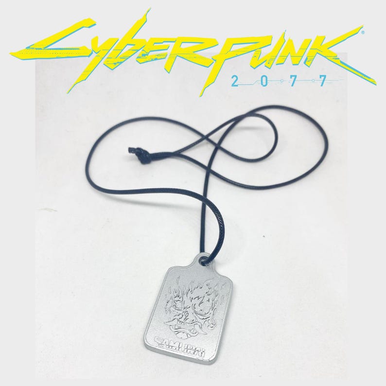 Może przedstawiać: Zestaw trzech ceramicznych kubk&oacute;w z nakrapianym, matowym wykończeniem. Kubki są w odcieniach kremu, jasnoszarym i ciemnoszarym. Każdy kubek ma prosty, minimalistyczny design.