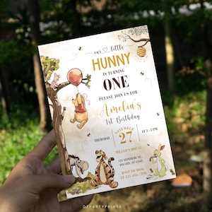 Vintage Winnie the Pooh birthday invitation, classic storybook style, editable Canva template, printable digital card for first birthday.