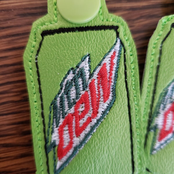 Green soda can key chain/snap tab