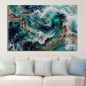 May include: A rectangular wall art print featuring an abstract ocean wave design with swirling shades of deep teal, turquoise, and navy blue, accented by intricate metallic gold veins and white sea foam crests across the entire composition.