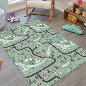 May include: A green play mat with a road map design. The mat features roads, rivers, houses, trees, mountains, and vehicles. The mat is designed for children's play and is made of a soft, durable material.