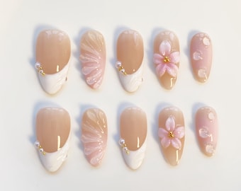Uñas francesas blancas con prensa francesa, uñas almendradas largas, uñas con flores rosas 3D, uñas elegantes, uñas de cumpleaños y uñas personalizadas.