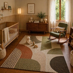 May include: A nursery with a wooden crib, rocking chair, and a patterned rug in shades of green, brown, and beige. A wooden cabinet and bookshelf are visible, along with a hanging mobile and framed artwork. The text "grow little one" is on the wall.