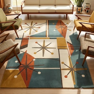 May include: A rectangular area rug featuring a geometric pattern with starburst motifs in shades of teal, mustard yellow, and burnt orange on an off-white background. The rug includes the text "COMPLETE MID-CENTURY LIVING." at the bottom edge.