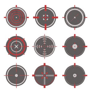 May include: Nine embroidered patches featuring various crosshair designs. Each patch is circular, with a dark gray background and a red and white crosshair pattern. The designs include concentric circles, cross shapes, and vertical and horizontal lines.