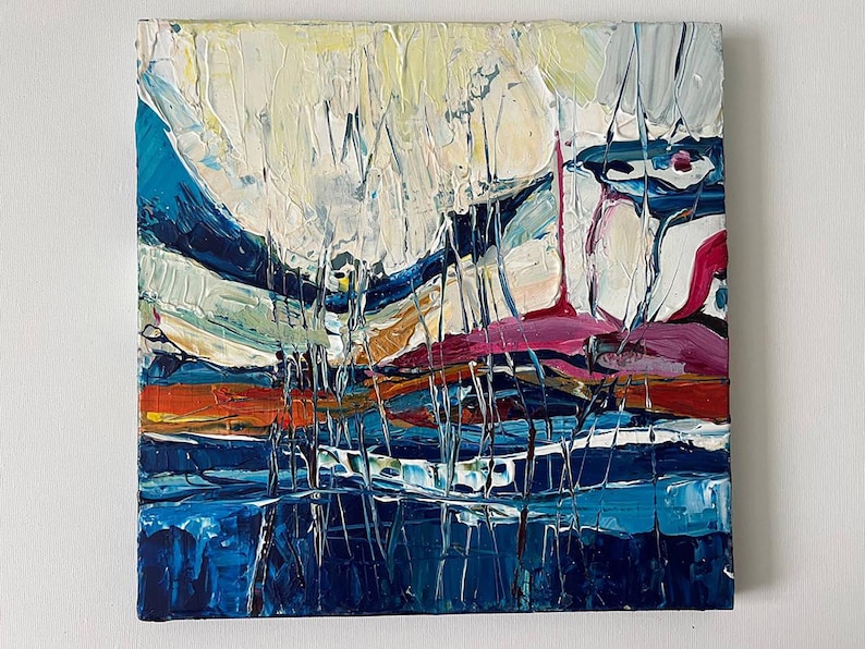 May include: Abstract oil painting with thick brushstrokes. The artwork features a landscape with blue, white, orange, and pink hues. Vertical lines add texture and depth to the composition, creating a dynamic visual experience.