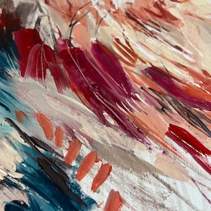 May include: Abstract painting with visible brushstrokes in shades of red, pink, blue, and beige. The artwork features a textured canvas with dynamic, expressive strokes, creating a sense of movement and depth. The color palette is warm and inviting.