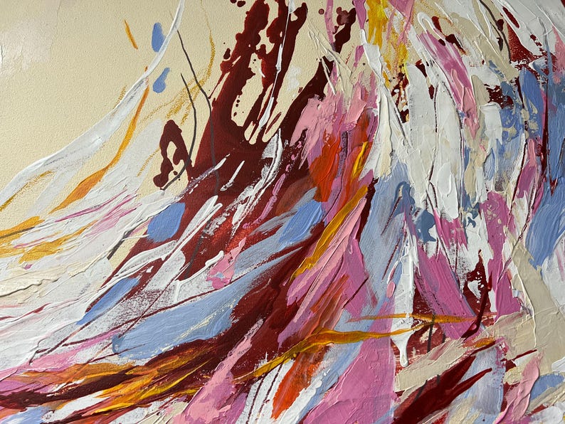 May include: Abstract painting with a cream-colored background and bold brushstrokes in shades of red, pink, white, blue, and yellow. The artwork features a textured, layered effect, creating a dynamic and expressive composition.