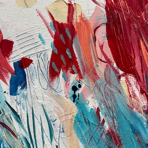 May include: An abstract painting on canvas featuring thick, textured brushstrokes in vibrant shades of red, bright turquoise, and soft cream. The composition includes layered paint applications, visible palette knife marks, and small dark blue ink splatters.