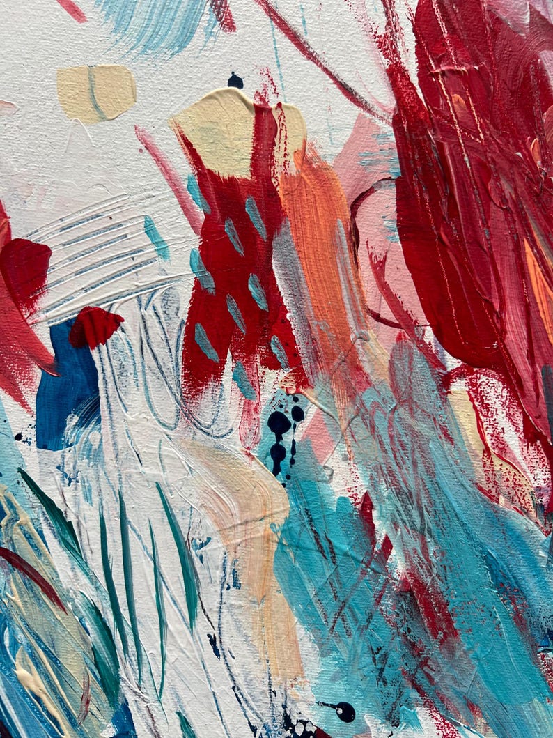 May include: An abstract painting on canvas featuring thick, textured brushstrokes in vibrant shades of red, bright turquoise, and soft cream. The composition includes layered paint applications, visible palette knife marks, and small dark blue ink splatters.