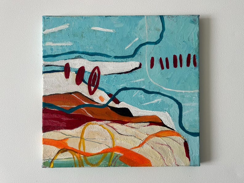 May include: Abstract painting on canvas with a textured surface. The artwork features a turquoise sky, white clouds, and a landscape with orange, red, and yellow shapes. Dark blue and red lines add definition to the composition.