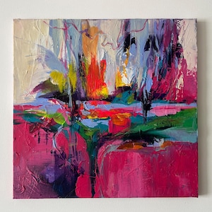May include: Square abstract painting with a textured surface. The artwork features a vibrant mix of colors, including shades of pink, red, orange, blue, and green. The brushstrokes create a dynamic and expressive composition, evoking a sense of depth and movement.