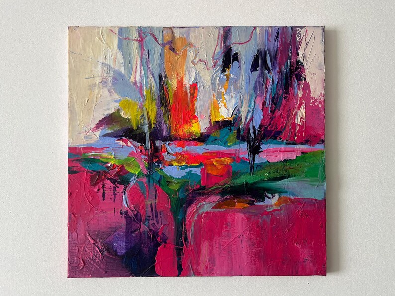 May include: Square abstract painting with a textured surface. The artwork features a vibrant mix of colors, including shades of pink, red, orange, blue, and green. The brushstrokes create a dynamic and expressive composition, evoking a sense of depth and movement.