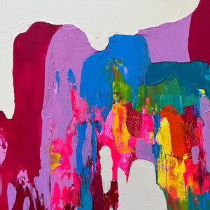 May include: Abstract artwork with thick brushstrokes in vibrant colours. The painting features a white background with bold strokes of magenta, blue, green, yellow, orange, and purple. The paint has a textured, layered appearance.